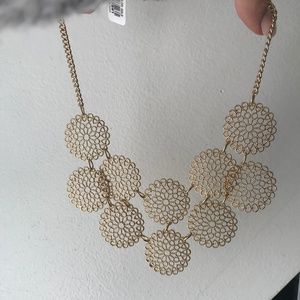 Gold flower bib necklace